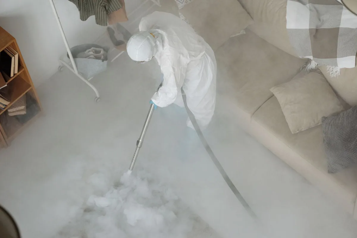 Biohazard cleanup technician in protective equipment, Wood-Ridge, NJ